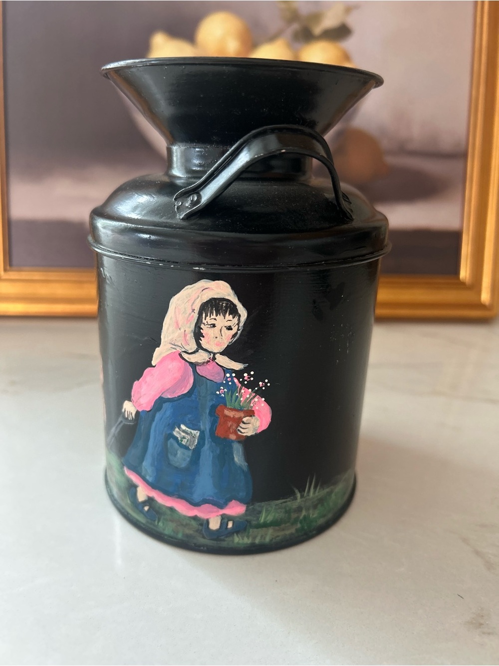 Hand-Painted Black Decorative Canister with Girl Motif